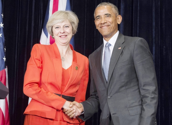 英国首相特雷莎•梅和美国总统奥巴马在杭州G20峰会期间的新闻发布会上。(AFP/Getty Images) 英国首相特雷莎•梅和美国总统奥巴马在杭州G20峰会期间的新闻发布会上。(AFP/Getty Images)