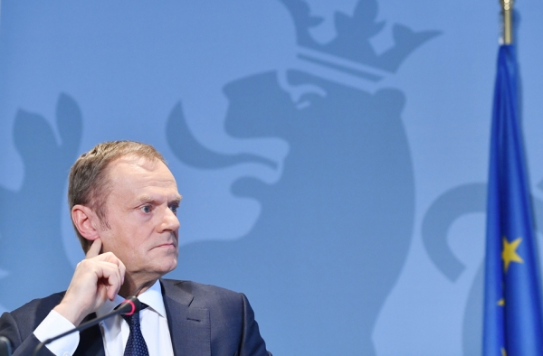 2018年3月7日,欧盟主席图斯克在新闻发布会上表示,欧盟并不想在英国离开欧洲联盟的时候“建造一堵墙”,“相反,英国将成为我们最亲密的邻居,我们希望保持朋友和合作伙伴关系。”(AFP/Getty Images) 2018年3月7日,欧盟主席图斯克在新闻发布会上表示,欧盟并不想在英国离开欧洲联盟的时候“建造一堵墙”,“相反,英国将成为我们最亲密的邻居,我们希望保持朋友和合