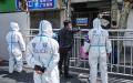 2022年3月15日在上海发现新的Covid-19病例后，警察展开监控行动。（HECTOR RETAMAL/AFP via Getty Images）