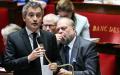 法国内政部长达尔马南（左）在国民议会上发言。（THOMAS SAMSON/AFP via Getty Images）