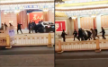 两会期间，有人驾车冲撞中南海，司机被拖出车抬走。（网络截图）
