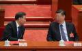 2019年3月15日，中共党魁习近平（右）和中国人民政治协商会议主席汪洋（左）出席全国人民代表大会第四次全体会议。（图片来源：Andrea Verdelli/Getty Images）