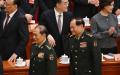 2025年3月10日，中国人民政治协商会议在北京闭幕，中央军委副主席何卫东（左）、中央军委副主席张又侠（右）在闭幕式后离开人民大会堂（图片来源：GREG BAKER/AFP via Getty Images）
