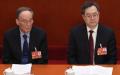 中共国家副主席王岐山（左）和政治局常委丁薛祥（右）于 2023年3 月 日出席第十四届全国人民代表大会第一次会议开幕式。（图片来源：Lintao Zhang/Getty Images）