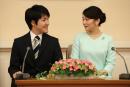 真子公主和一家律师所的雇员小室圭结婚。(SHIZUO KAMBAYASHI/AFP/GettyImages)