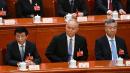 2023年3月12日，全国政协主席王沪宁5（左），政治局常委蔡奇（中）、李希（you）在北京人民大会堂出席全国人民代表大会第五次全体会议。（图片来源：NOEL CELIS/AFP via Getty Images）