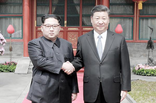 金正恩与习近平(Getty Images)