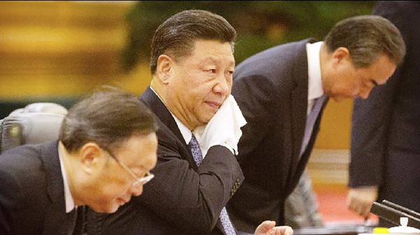 习近平要求各级官员绝不能做昏官、懒官、庸官、贪官,同时要求各部门强化抓党建,坚持“书记抓、抓书记”。(Getty Images)