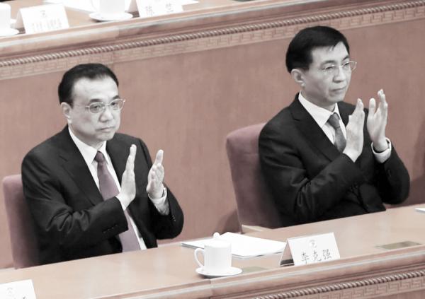 两会上的李克强与王沪宁 (AFP/Getty Images)