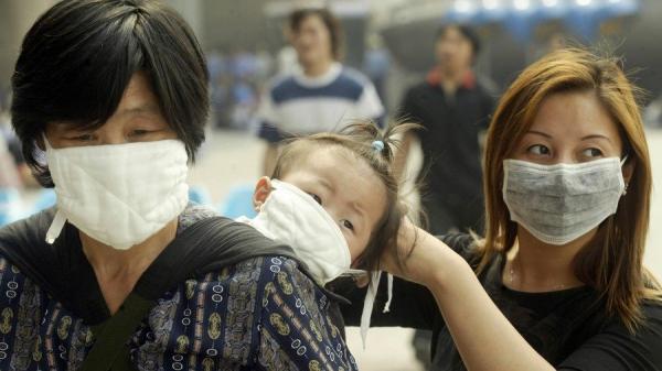 2003年中国爆发非典(SARS)疫情(图片来源:PETER PARKS/AFP/GettyImages)