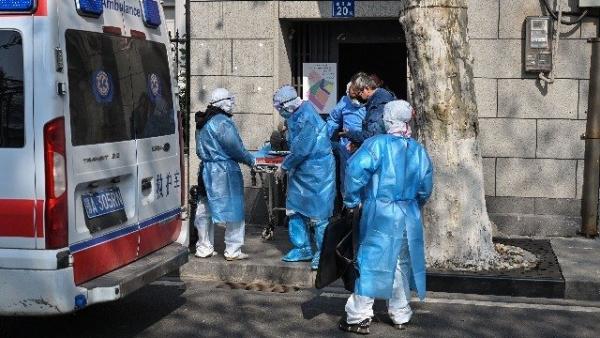 世卫专家团不去重灾区湖北武汉考察,让外界不禁开始质疑北京政府是否害怕武汉肺炎的真实疫情全貌曝光。(图片来源:HECTOR RETAMAL/AFP via Getty Images)