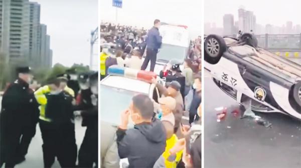 江西和湖北两地警察发生争执、扭打，引发大规模群体事件（图片来源：视频截图）