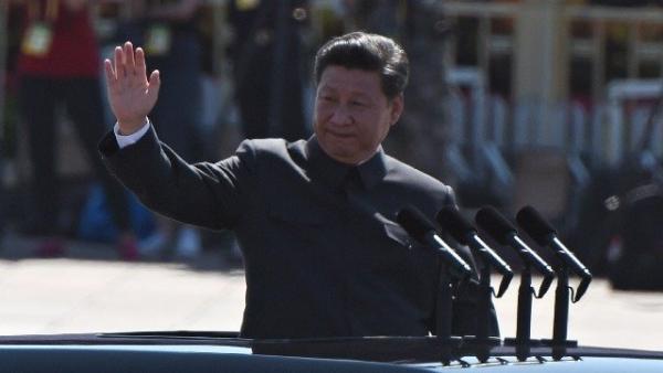 习近平近期整军动作异乎寻常,难掩其对枪杆子的掌控忧心忡忡(图片来源: GREG BAKER/AFP/Getty Images)