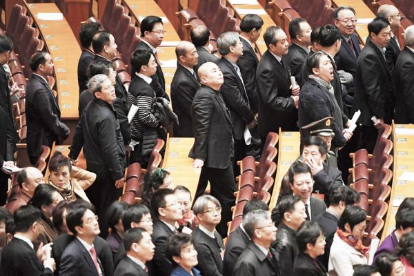 参加两会的官员(GREG BAKER/AFP/Getty Images)