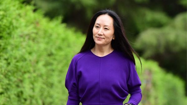 孟晚舟回国受到英雄般的接待，不过父亲任正非却没有出现在机场。（图片来源：Getty Images）