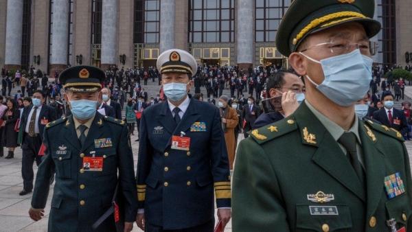 习近平一再强调军队要听党指挥,实际是暗示军队要听从“习核心”的指挥。(图片来源:Kevin Frayer/Getty Images)