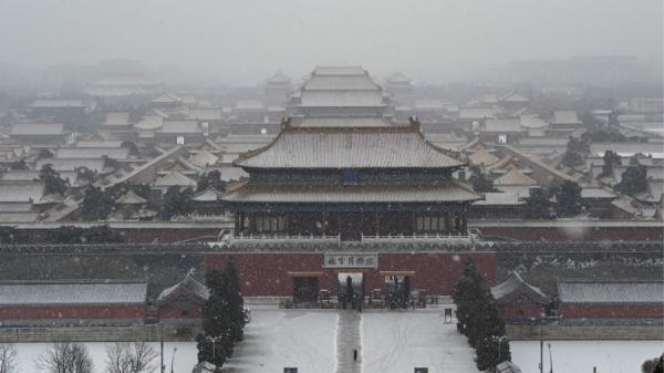 2022 年1月20日,北京紫禁城在景山公园的雪天全景。(图片来源:JADE GAO/AFP via Getty Images)