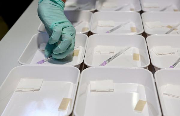 Covid-19疫苗(TOBIAS SCHWARZ/AFP via Getty Images)