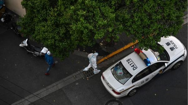 近日一名40多岁的韩国派驻人员被发现死在上海公寓中。(图片来源: HECTOR RETAMAL/AFP via Getty Images)