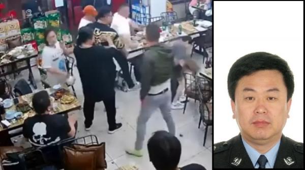 根据网传视频显示,刚被查的唐山市公安局路北分局局长马爱军当时正在事发的烧烤店内。(图片来源:视频截图)