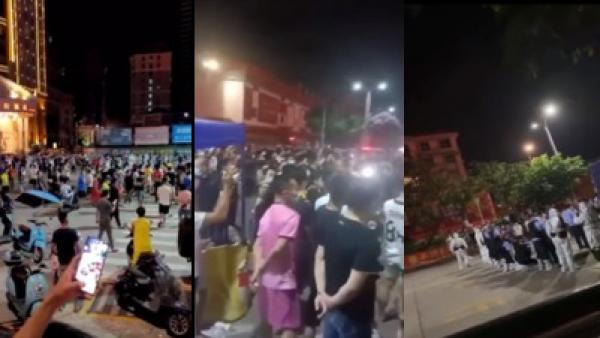 广西北海封控一个多月后,网传8月15日北海市所有被封控小区的居民聚集一起抗议,北海官方紧急通知次日解封。(图片来源:视频截图)