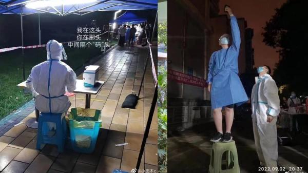 一些大白举着手机搜信号。(图片来源:微博)