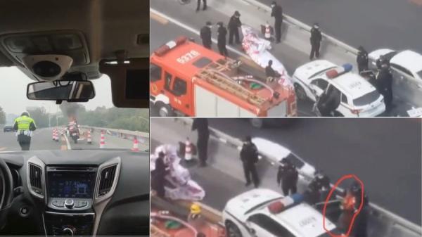 北京四通桥一名男子挂横幅抗议,相关画面13日在网络疯传,遭到中共封杀。(图片来源:网络截图)