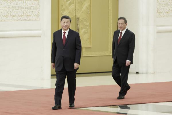 习近平与新任政治局常委李强(Lintao Zhang/Getty Images)