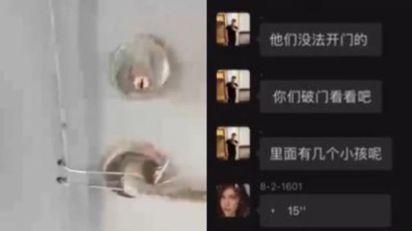 有小区居民拍摄到楼里通道门被锁死的画面。也有当地市民拍视频披露,大火发生时门被锁死他们根本无法逃生。(图片来源:网络截图)