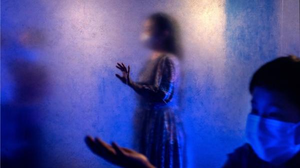 中国武汉肺炎疫情大爆发后,中国许多确诊民众出现诡异症状。示意图。(图片来源:Kevin Frayer/Getty Images)