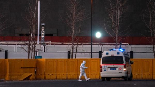 近期中国疫情肆虐,官方始终低调处理大批死亡案例。示意图。(图片来源:Kevin Frayer/Getty Images)