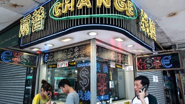 疫情后,越来越多中国人开始把资产转移到国外。(图片来源:PHILIPPE LOPEZ/Getty Images)