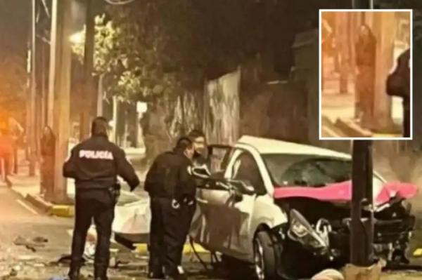 一幕诡异的画面被捕捉了下来!事故现场这张照片有位披着黑色斗篷的人在后方徘徊,疑似是“幽灵”。( 图片来源:网络截图)