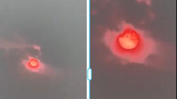 网络流传多段视频显示，黑龙江省会哈尔滨天空的太阳变成血红色。（图片来源：网络图片）