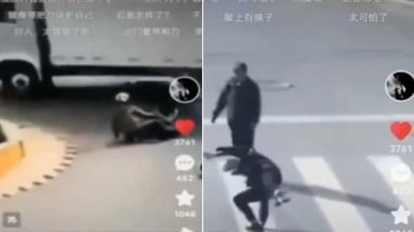 中国大街上出现把人套住再自动吸入汽车内的神秘车辆。(图片来源:视频截图)