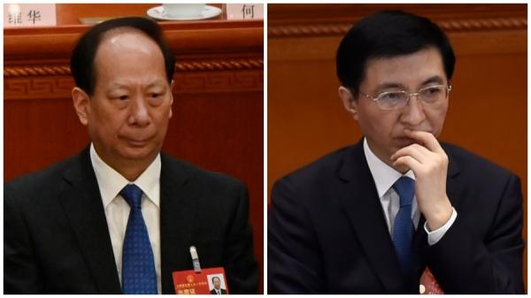 全国政协副主席石泰峰(左)和中共中央政治局常委、全国政协主席王沪宁(右)。