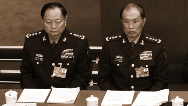 中共中央军事委员会副主席何卫东（右）、张又侠（左）于2023年3月5日出席第十四届全国人民代表大会第一次会议开幕。