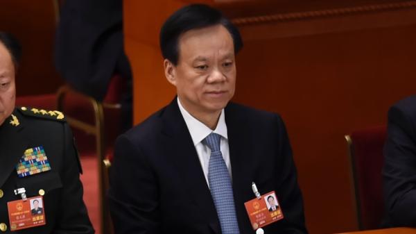 图为2018年3月5日,时任重庆市委书记、十八届中央委员陈敏尔在北京人民大会堂出席全国人民代表大会开幕会议。(图片来源:WANG ZHAO/AFP via Getty Images )