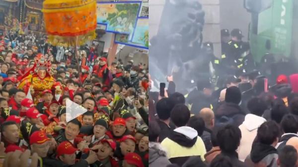 福建福州长乐区民间“游神”活动警察人墙被冲垮。(图片来源:抖音视频截图)