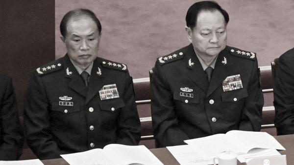 何卫东(左)与张又侠(右)(NOEL CELIS/AFP via Getty Images)