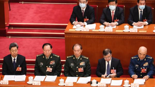 (左至右)陈文清、张又侠、何卫东、李书磊和许其亮于2023年3月5日在中国北京人民大会堂出席第十四届全国人民代表大会第一次会议开幕。(图片来源:Lintao Zhang/Getty Images)