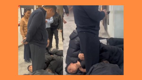 2月9日,甘肃甘南州多名农民工抱着老板的大腿讨薪。 (图片来源:视频截图)