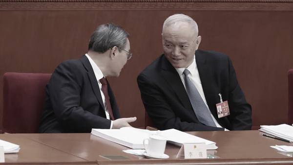 蔡奇(右)出席会议。(Lintao Zhang/Getty Images)