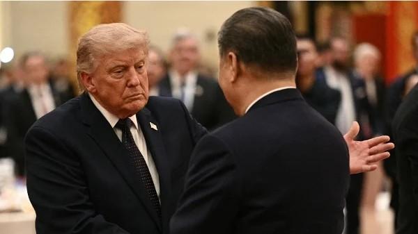 川普与习近平。(图片来源: Brendan SMIALOWSKI / AFP via Getty Images)